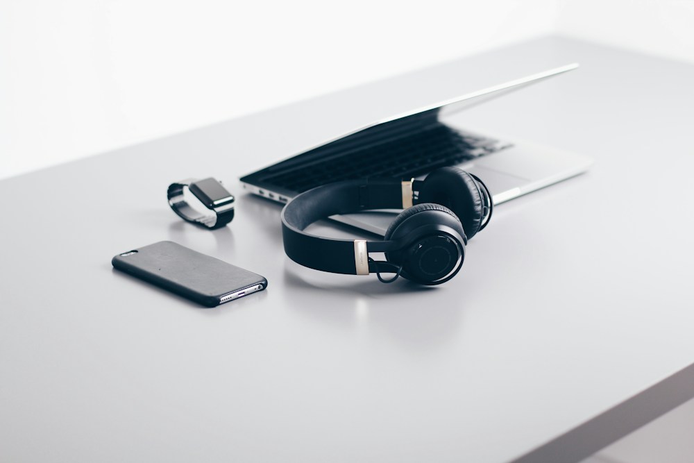 A collection of electronics and desktop accessories